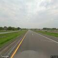 Semi truck crossing center line in fog on I-94