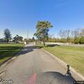 Officer checks vehicle at Forest Lawn Cemetery