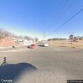 Traffic stop on blue pickup near highway junction