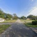 Officer checks on woman walking in roadway