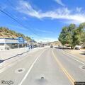 Disabled vehicle with flat tire on US 50