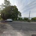 Car blocked by parked SUV with trailer on Harbor Road