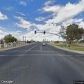 White vehicle blocking road near 111th avenue and Peoria