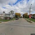 Smoke alarm sounding at home on East Brown Street