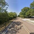 Cars racing at high speed on Country Club Road
