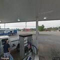 Officer checks person behind Junior Foods