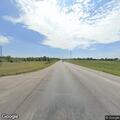 Van and trailer reported in ditch on State Road 1
