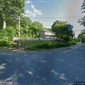 Large pile of leaves blocking roadway