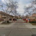 Person having difficulty breathing at apartment playground