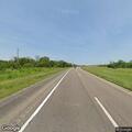 Speeding sedan without lights on Highway 23