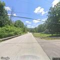 Tree on power lines sparking along Route 74