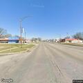 Gray car swerving on Main Street near hospital