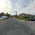 Person yelling and going onto porches in Dundalk