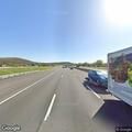 Person lying on highway shoulder raises welfare concern