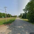 Man threatens someone and runs into Nebraska St home
