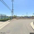 Rail crossing gates leaning over tracks in Los Angeles