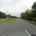 Gasoline spill on roadside at Coop Road intersection