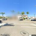 Contained refuse fire closes Fourth Street