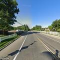 Stopped vehicle blocking lane on Bethpage Highway