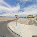 Cyclist riding on I-15 northbound ramp shoulder