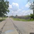 Person reported inside garage of vacant house