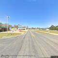 Vehicle rolls over off road at highway intersection