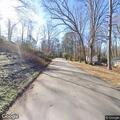 Officer stops motorcycle on Baker Road