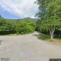 Disabled box truck on roadside near campground