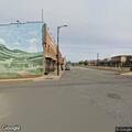 Person standing in middle of West Gold Street