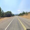 Small vegetation fire near US‑97 in Weed