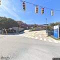 Police vehicle and car collide at intersection