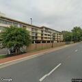 Suspicious vehicle idling at hotel parking lot