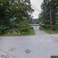 Wire fire by transformer spreading to nearby trees