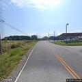 Motorcycle rider pinned under tractor trailer in crash