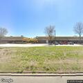 Person experiencing cardiac emergency at industrial park