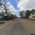 Vehicles passing stopped school bus in Sparta