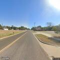 Officer checks report of water main break