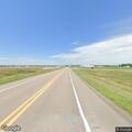 Pickup swerving on US-183 near Elm Creek