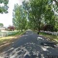 Traffic stop on Farm Road involving blue Jeep