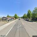 Reckless red sedan towing trailer near North Ashland