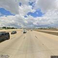 Car with flat tire on State Highway 121