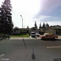 Silver minivan blocking view at intersection
