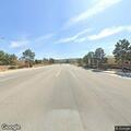 Person walking in traffic in Palmdale
