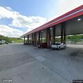 Traffic crash behind gas station on North Expressway