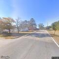 Traffic stop on white Tesla at Fair Road