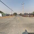 Suspicious person walking around parked vehicle
