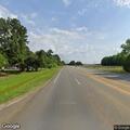 Loose goats creating road hazard near County Road 1800