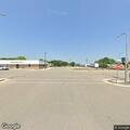 Vehicles blocking street work on North Division