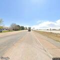 Traffic stop on red Subaru sedan in Firestone