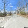 Pedestrian walking in roadway on Lagrange Road